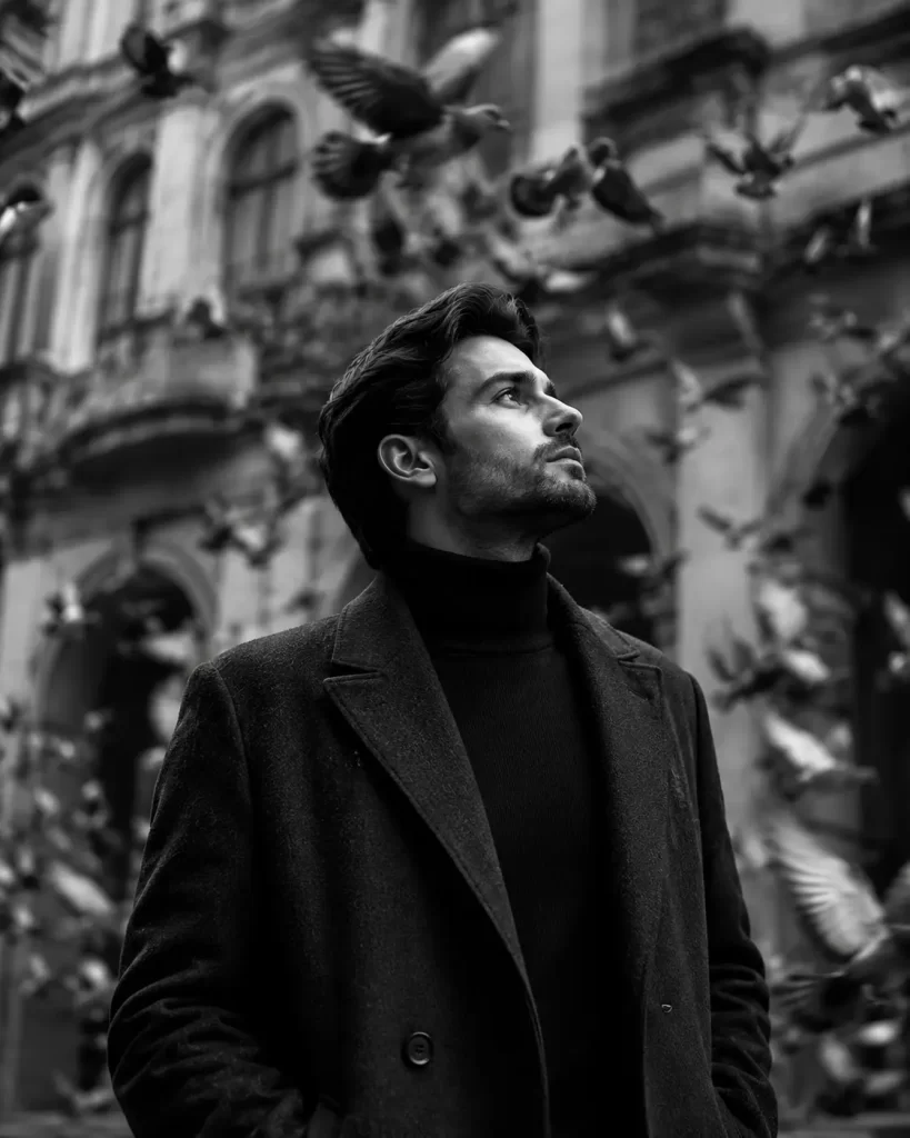 Cinematic Black-and-White Editorial Portrait with Swirling Pigeons